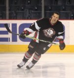 Ice hockey player Teppo Numminen in action with a nanotube-containing hockey stick.