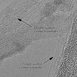This picture, taken with a transmission electron microscope, shows carbon nanotubes that have been grown out of tiny cavities in a "porous anodic alumina template" created by Purdue engineers.