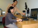 Researchers Min Zou (seated) and Hengyu Wang