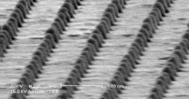 Transfer printed gold nanocones on ITO glass