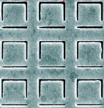 Array of squares cut into gold
