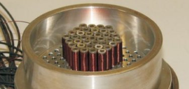 Magnetic coils drive ferrofluid deformable mirror