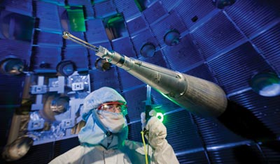 An NIF technician checks the target positioner
