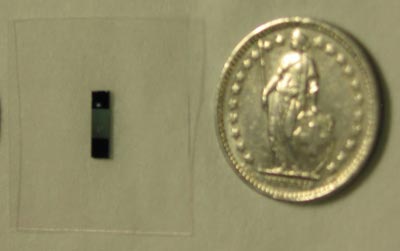 The device as compared with a coin