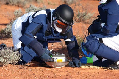Researchers inspect the Hayabusa capsule