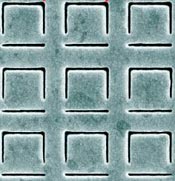 Array of squares cut into gold