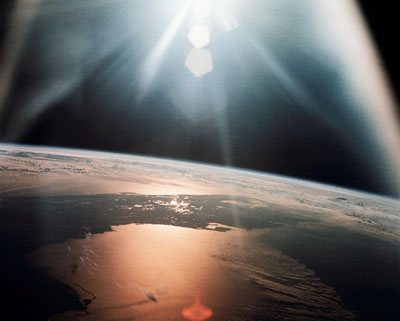 Photo of sunlight reflecting off the Gulf of Mexico and the Atlantic Ocean, taken from Apollo 7 mission
