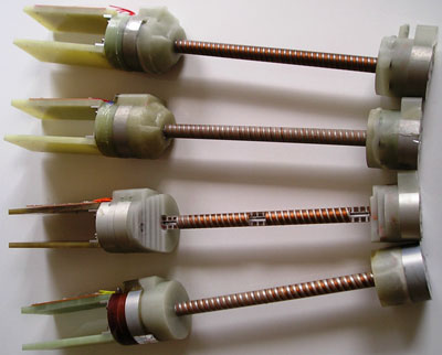 A photograph of four undulator prototypes that have been built and tested