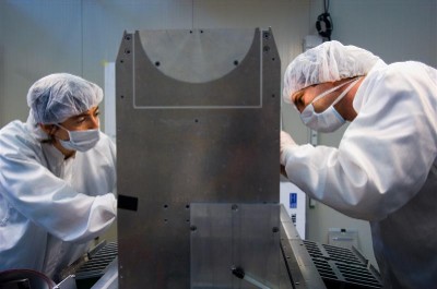Photo of two researchers at work in a laboratory