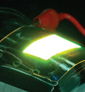 Photo of flexible display being patterned with LEDs