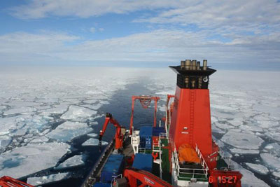 Photo of a German research vessel moving through sea ice in the Fram Strait