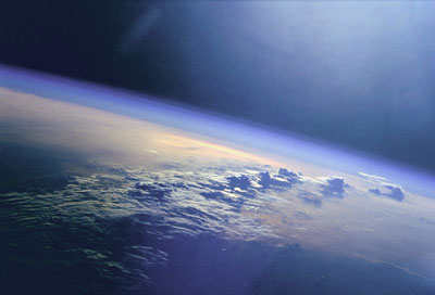 A photograph of clouds and sunlight over the Indian Ocean