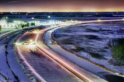 Photograph of the Tevatron particle accelerator at night