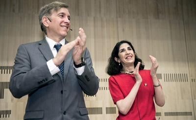 Photo of Joseph Incandela (left) and Fabiola Gianotti