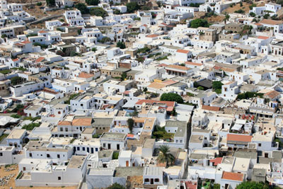 A photograph of traditional white roofs in Greece