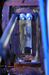 A photograph of the superradiant laser showing the cavity and the two mirrors