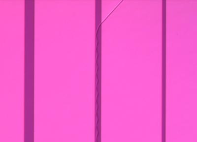 Microscope image showing cracks in a substrate/thin-film composite